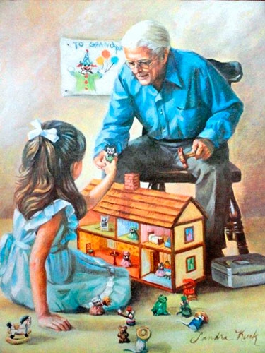 Дедушка играет с внучкой